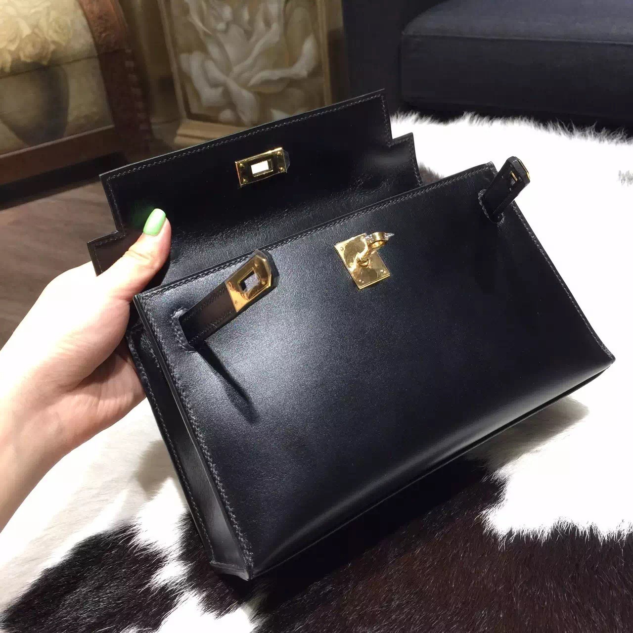 Missfazura carried H kelly pochette black swift leather with gold